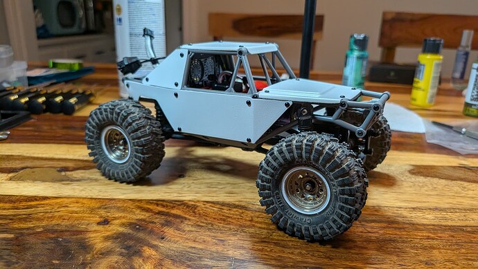 ^ White buggy under bluish light.